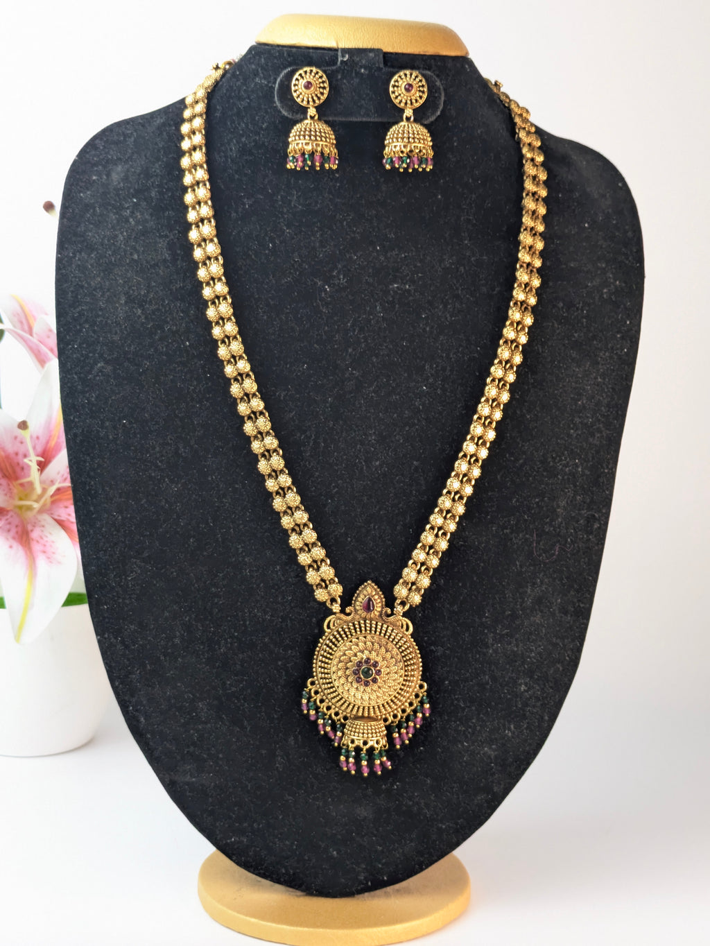 Temple jewelry design with an antique gold-plated finish.