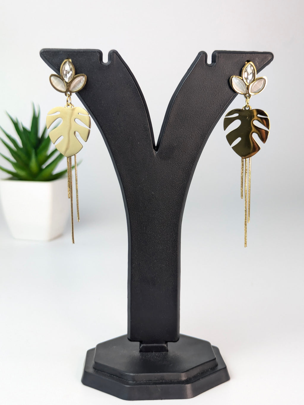 Dangler earrings with chain tassels