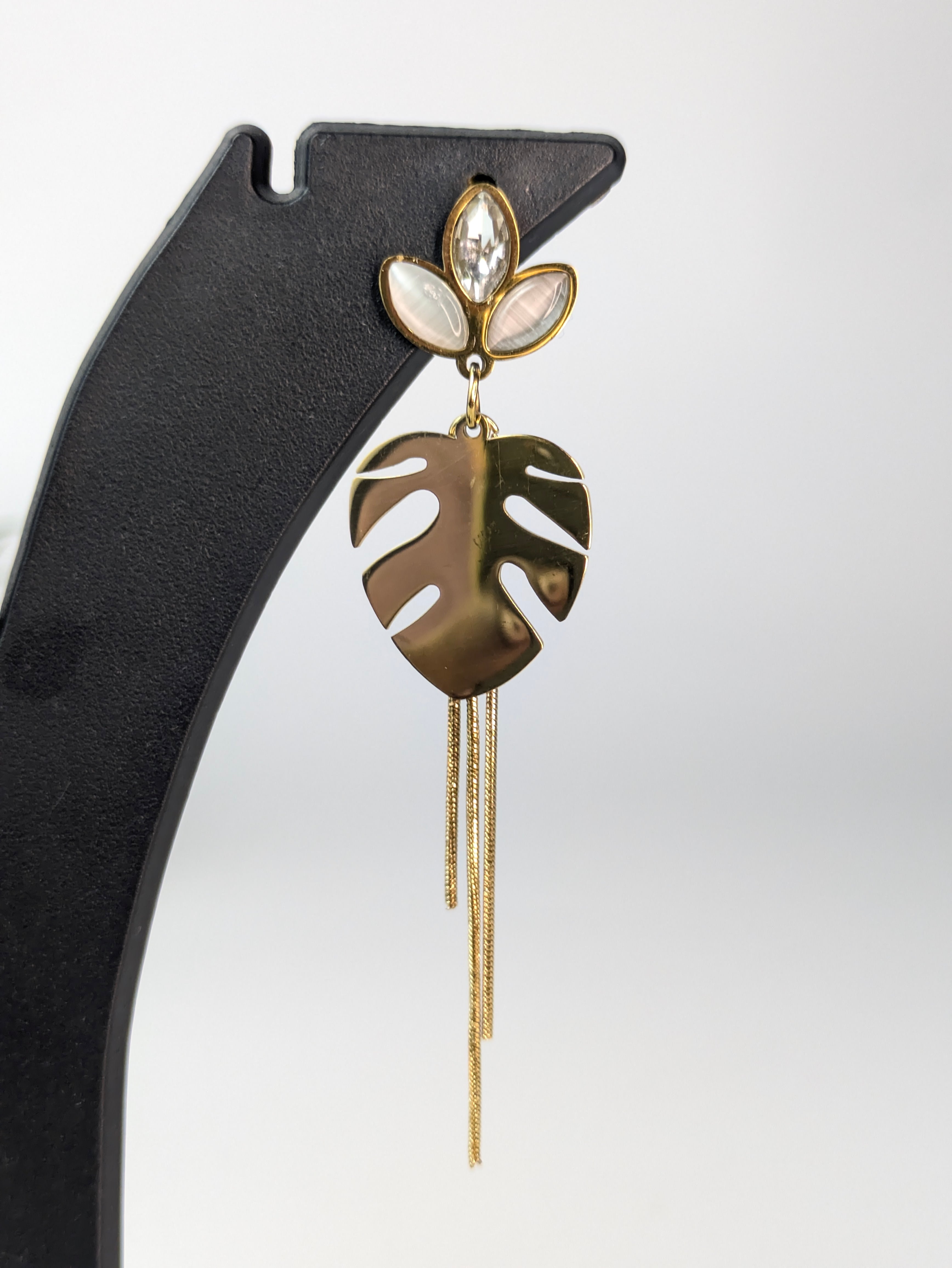 Dangler earrings with chain tassels