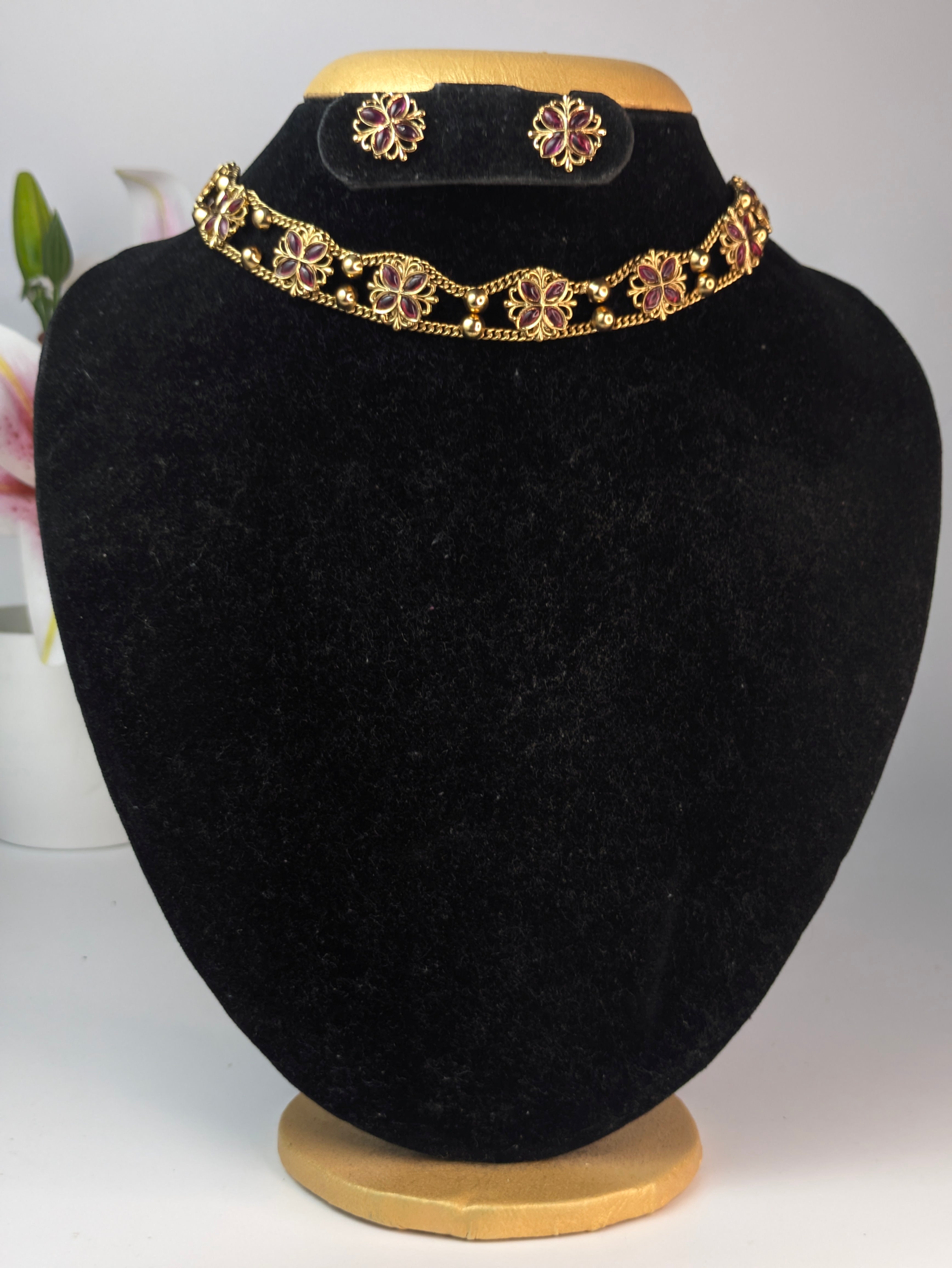Gold Tone Floral Choker Necklace with Red Stones