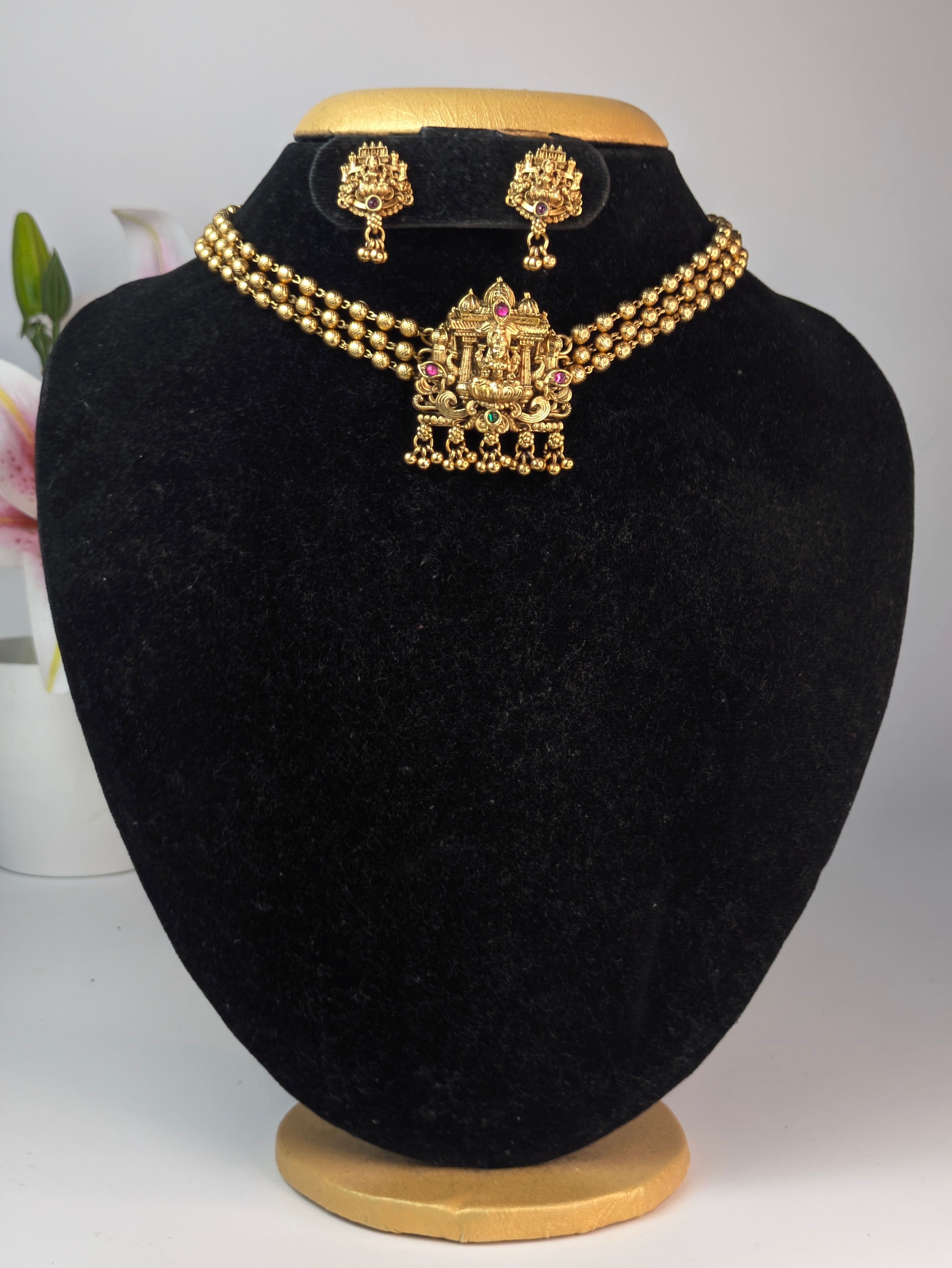 Antique Gold Finish Lakshmi Temple Choker Set.
