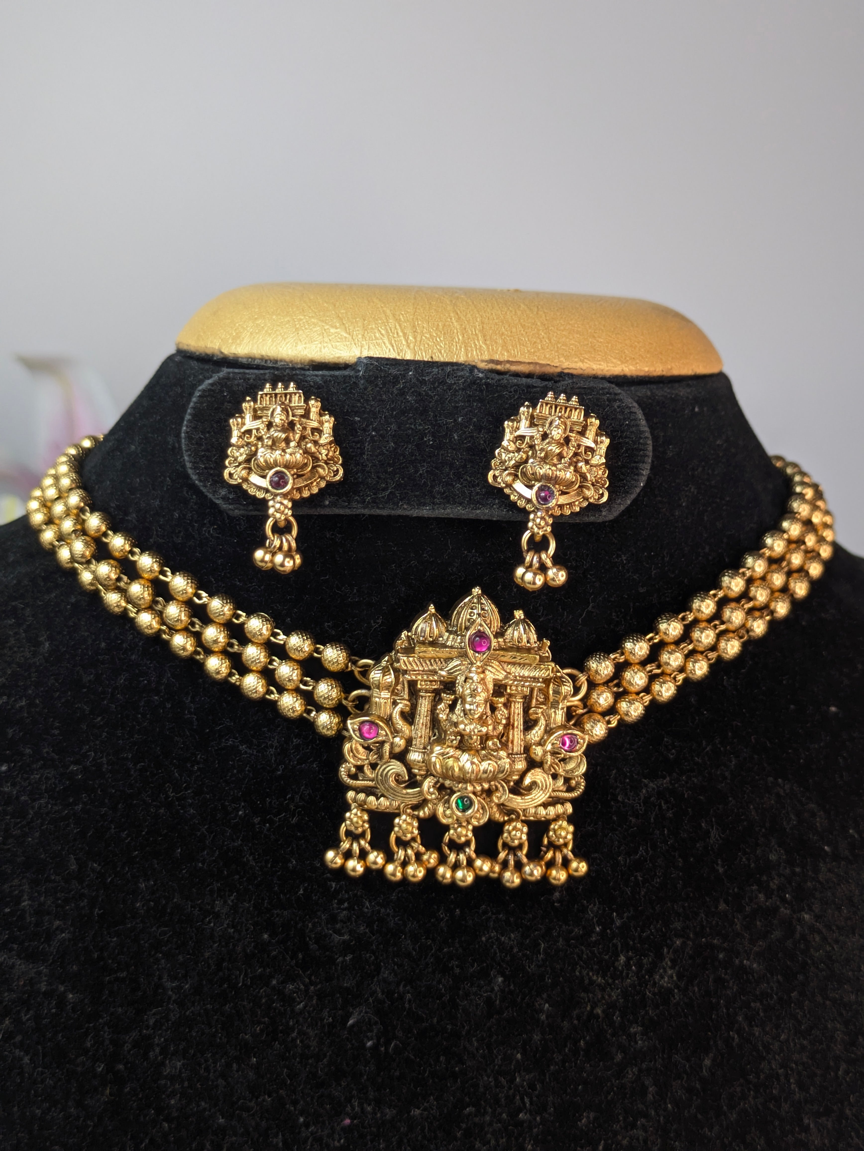 Antique Gold Finish Lakshmi Temple Choker Set.